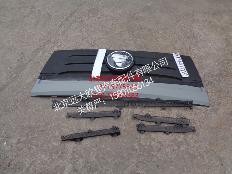 F1B22053104001B0A8002,翻转盖板总成（圆标）,北京远大欧曼汽车配件有限公司