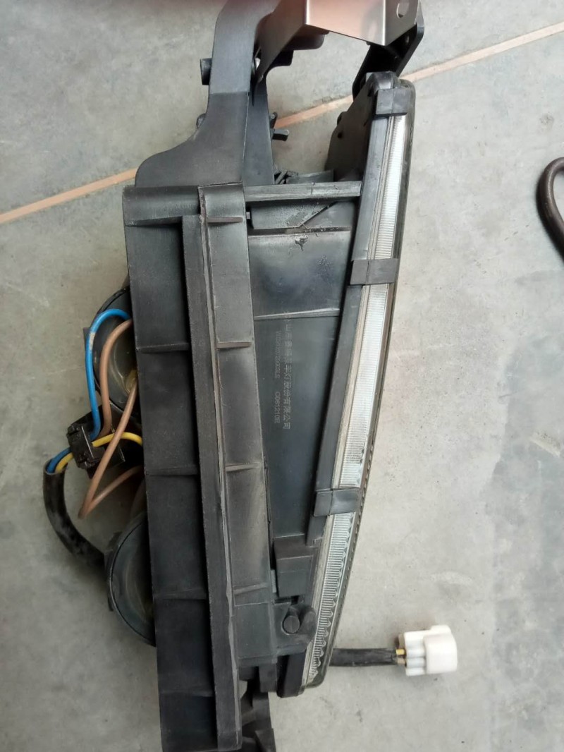WG9120720004,豪骏雾灯右,济南诺诚重型汽车配件有限公司