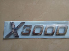 DZ14251950002,“X3000”标牌,济南尊龙(原天盛)陕汽配件销售有限公司