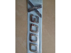 DZ14251950002,“X3000”标牌,济南尊龙(原天盛)陕汽配件销售有限公司